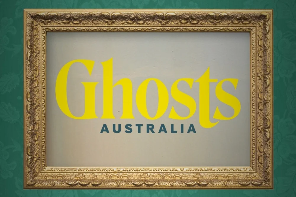 Gold Picture frame on a green background, framing the wording Ghosts Australia