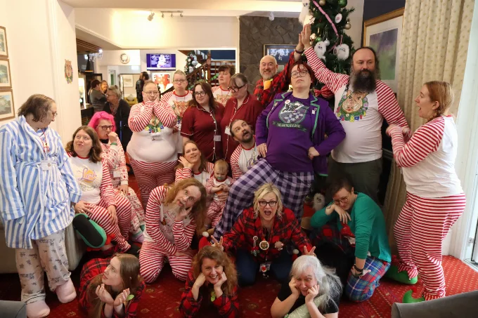 Photo of campers getting together for an awkward family photo