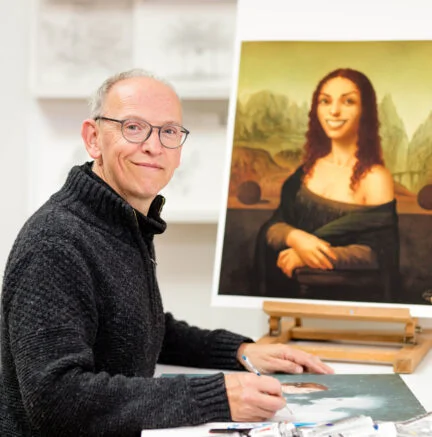 photo of Paul Kidby with his Mona Ogg in the background