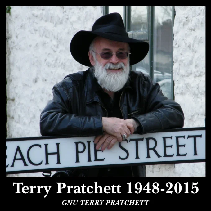 Photo of Terry taken by Jason in the back of the Dolphin pub in Wincanton, Terry is leaning on a sign that says Peach Pie Street
