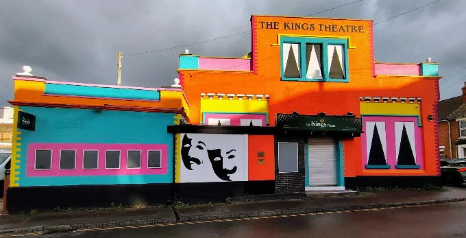 Photo of the very colourful outside of The Kings Theatre in Gloucester