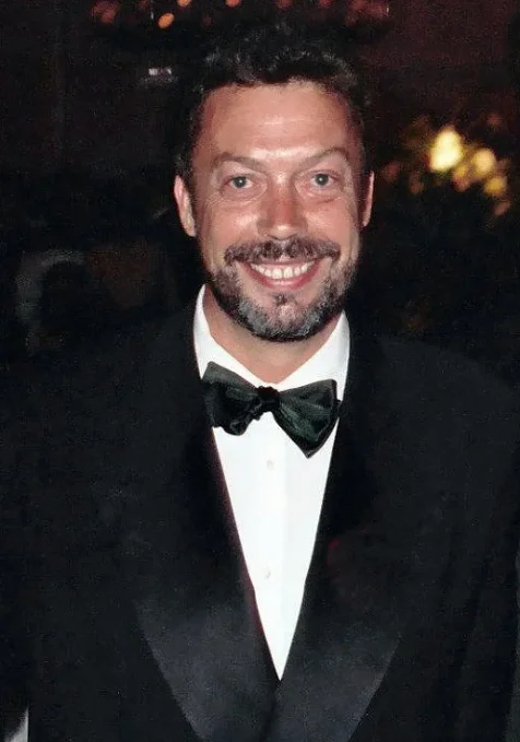 Tim Curry in evening jacket
